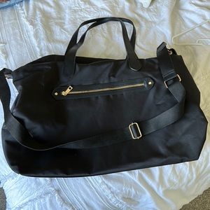 Target overnight black duffle bag with gold details